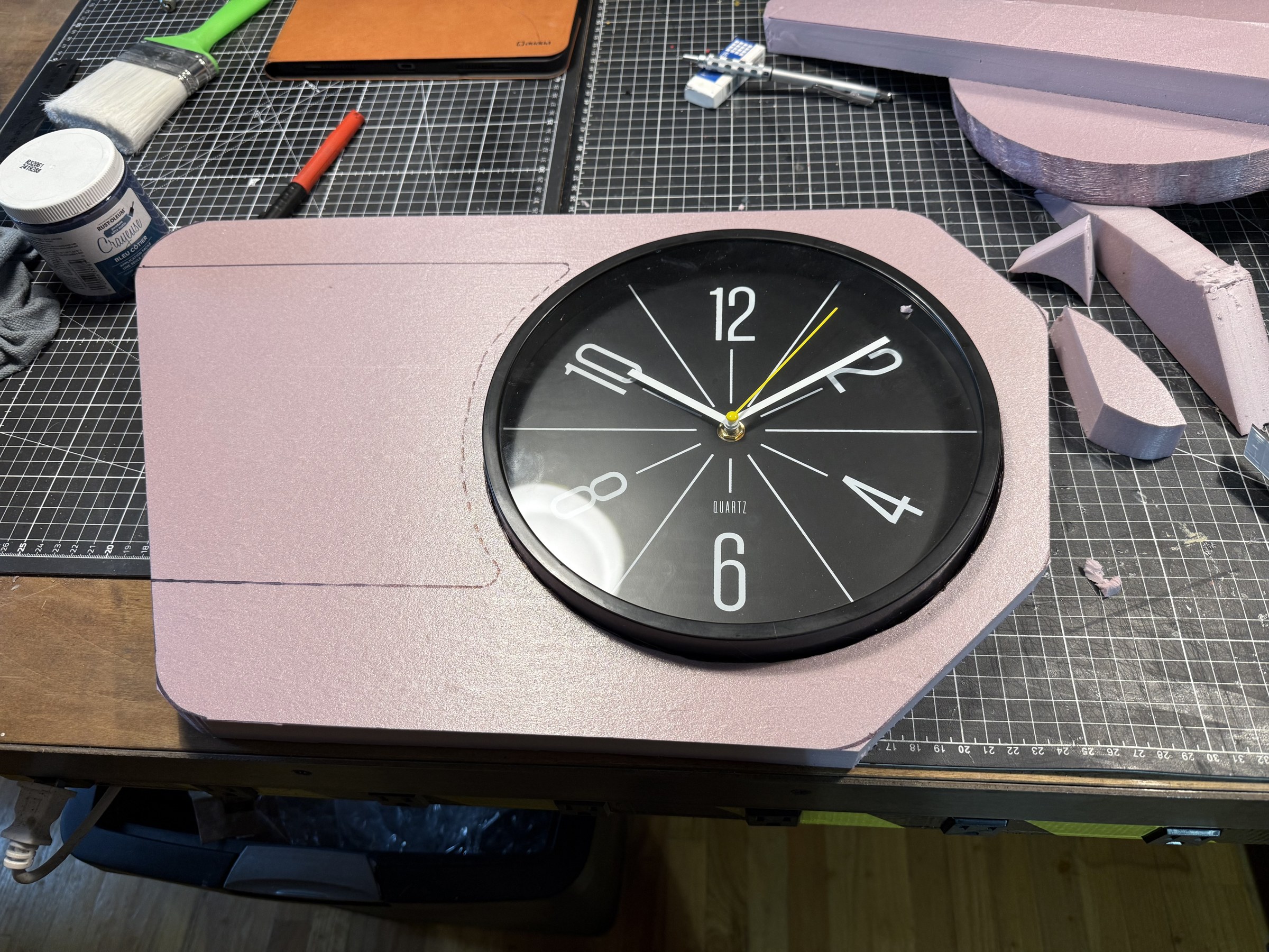 Clock mechanism test-fitted in the rough housing