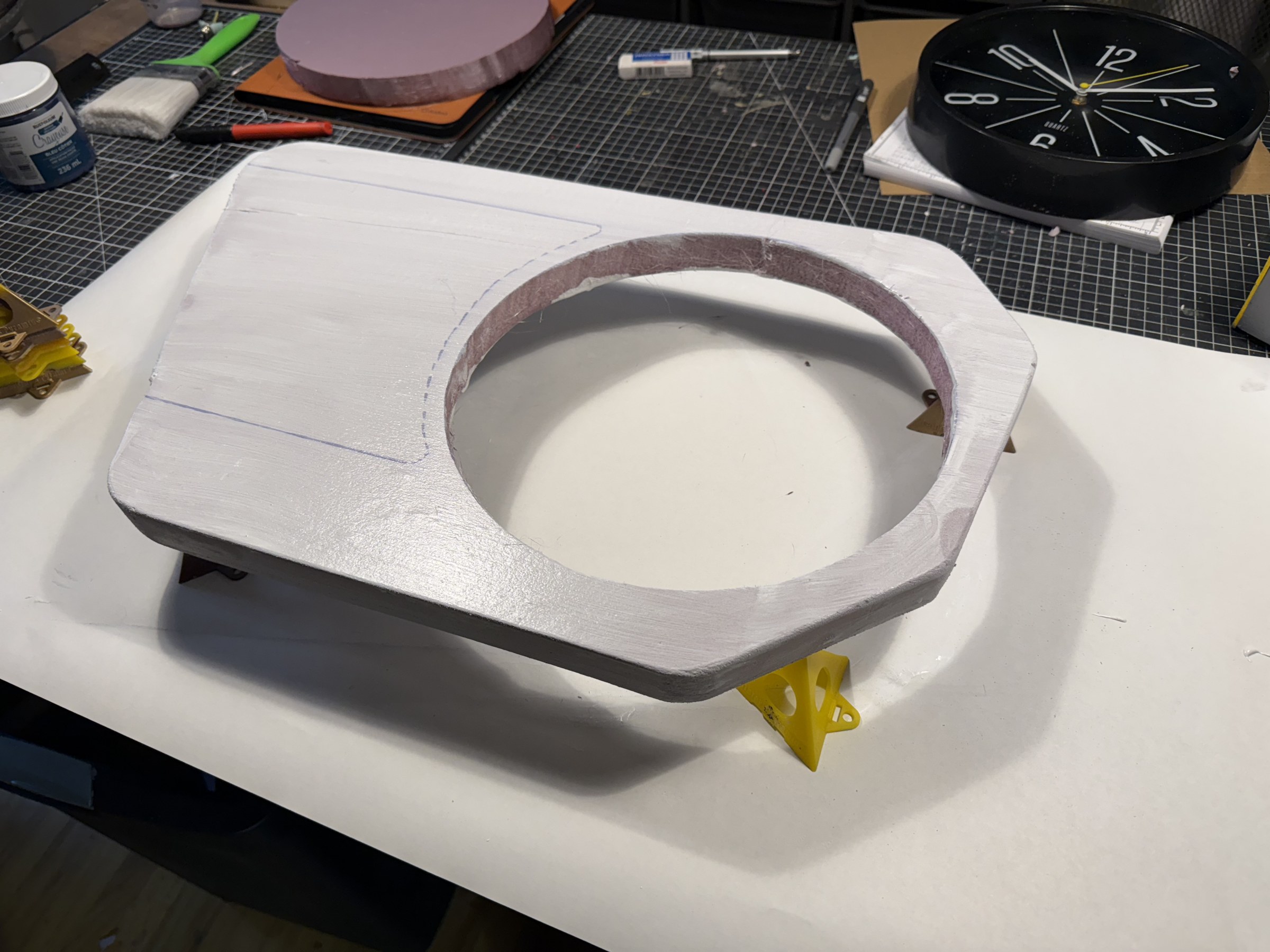 Shaped clock housing on the workbench