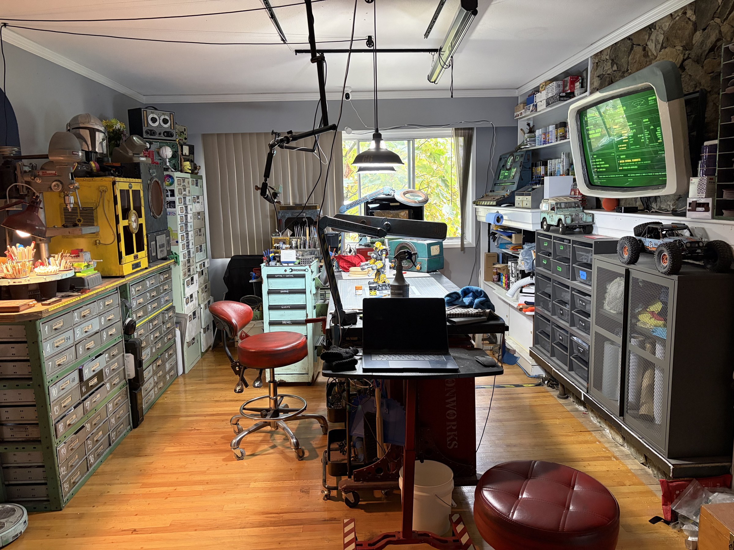 Inside Six Design Studio in Victoria, with workbenches, tools and original builds